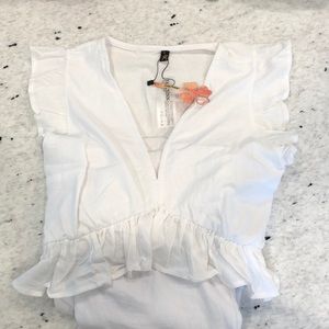 FANCYINN Women’s white 2 piece pant outfit. NWT. Very stunning. Size Small